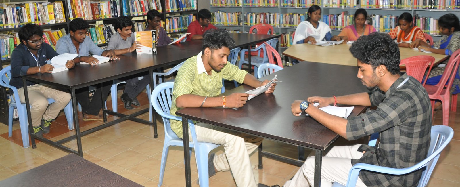 Students reading in the college library